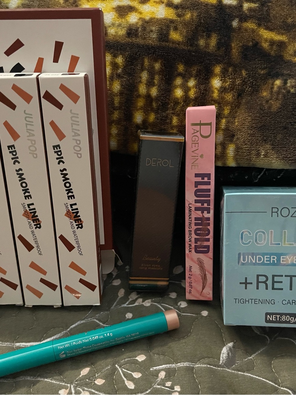 Eye liner, mascara, brow wax, under eye mask